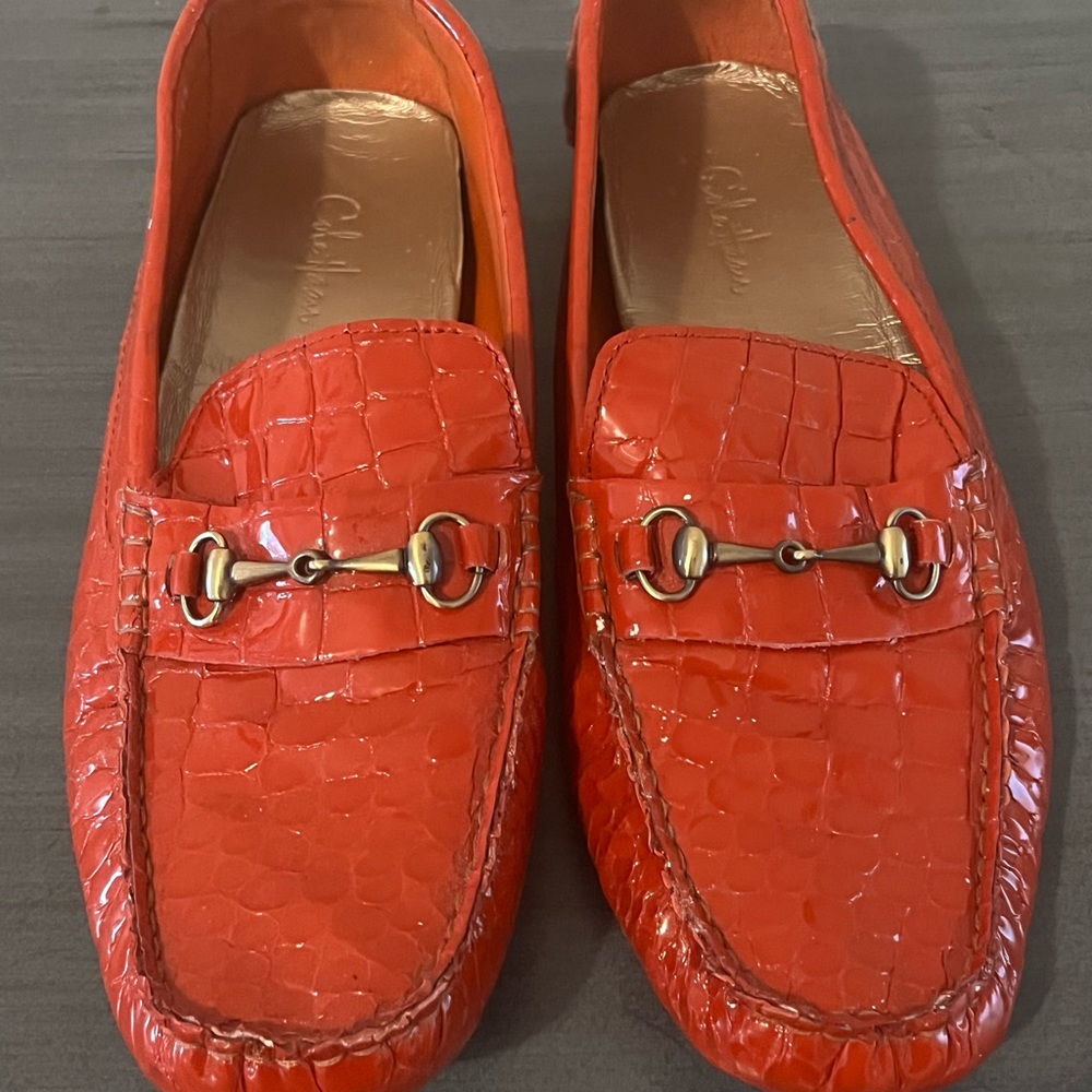 Cole Haan orange flats.